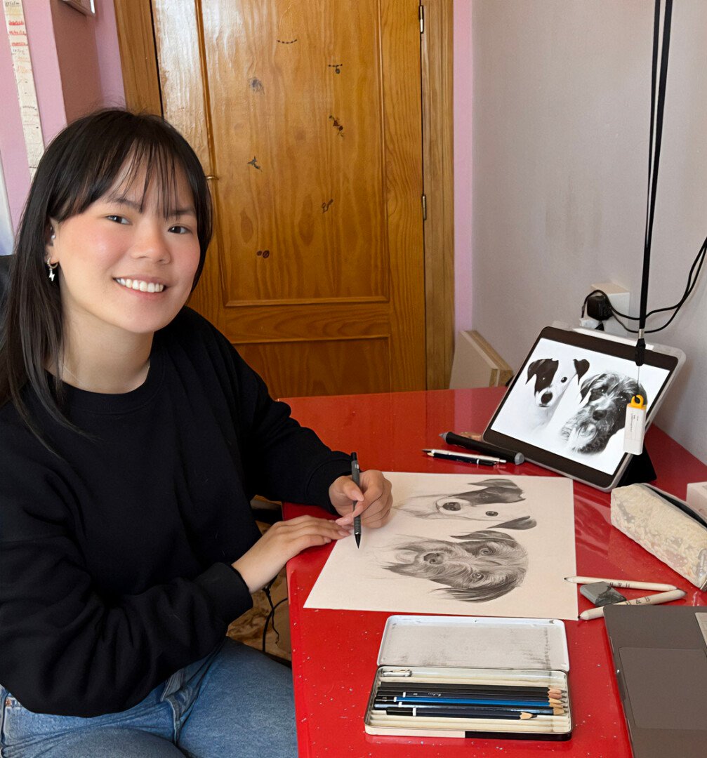 Meili at her drawing desk