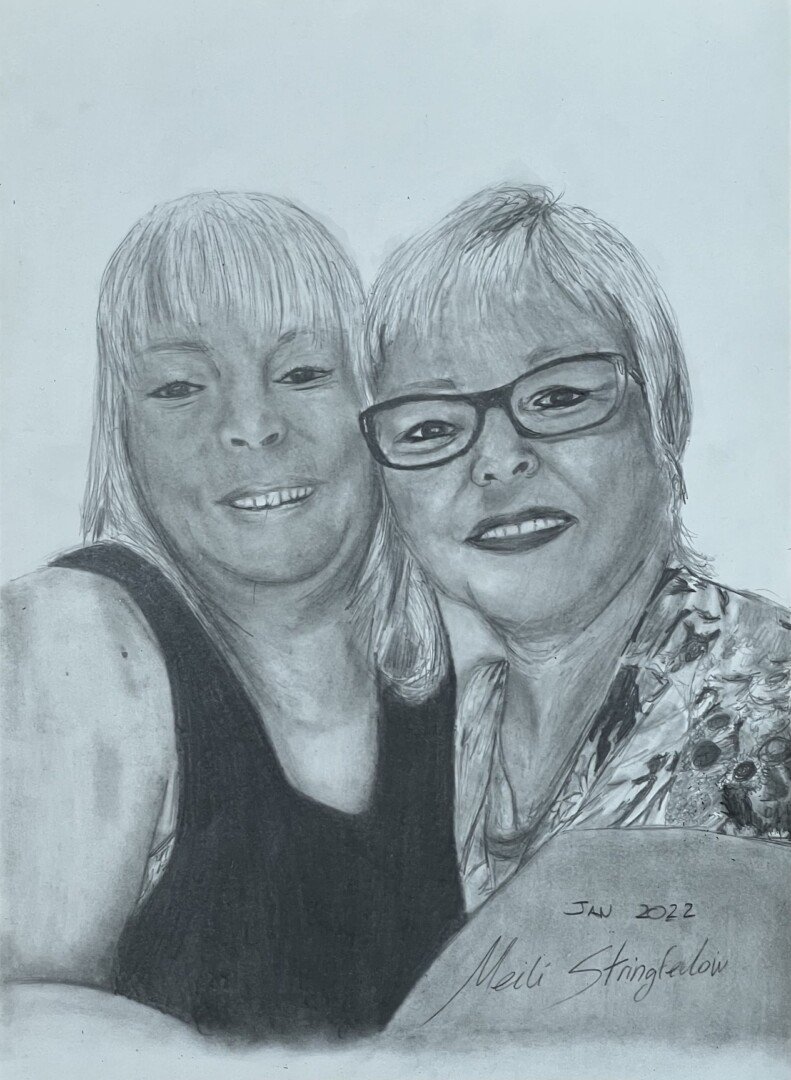 Mother and daughter drawing